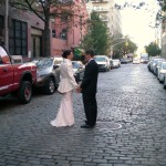Jessica & Tucker pause in the center of their street