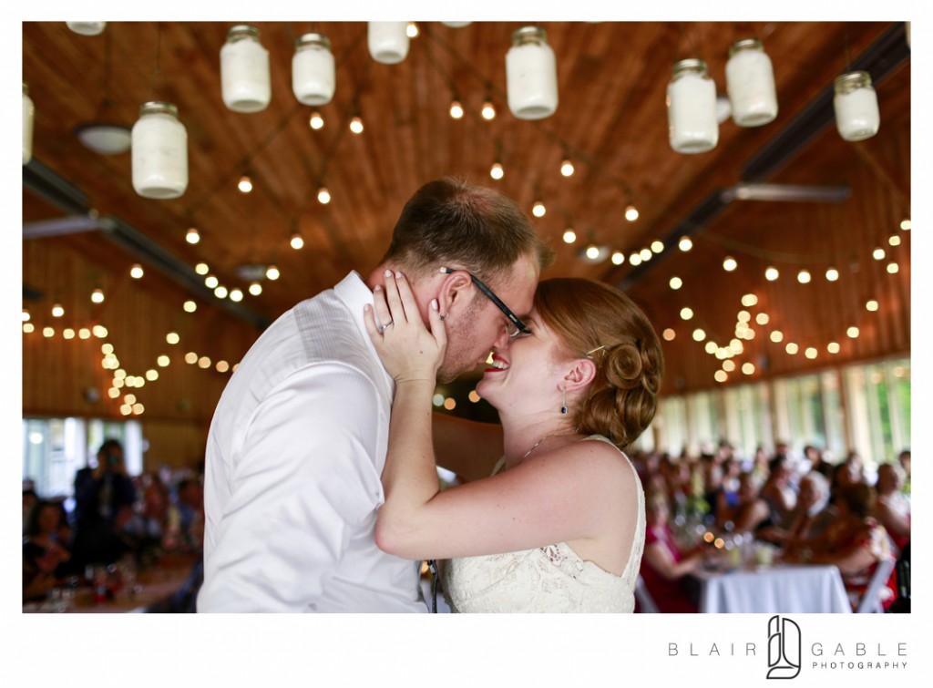 Kaitlin and Keith smooch at their reception
